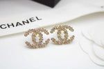 CH Pale Gold Tone Crystal CC Stud Earrings