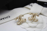 CH Pale Gold Tone Crystal CC Stud Earrings