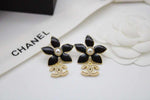 CH Flower And CC Logo Metal Dore Earrings