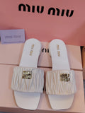 Matelesse Slide Sandals In Nappa Leather By Miu Miu - Saadstore