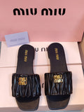 Matelesse Slide Sandals In Nappa Leather By Miu Miu - Saadstore